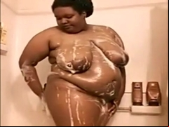 Amateur black Diamond takes a shower and masturbates